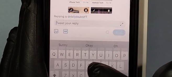 Person using a phone to comment on TikTok