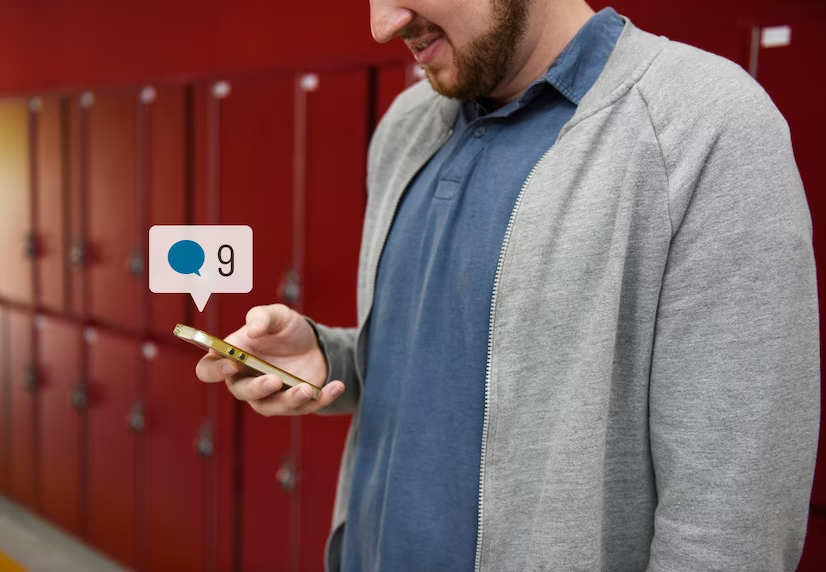 Man with Phone and Comment Icon